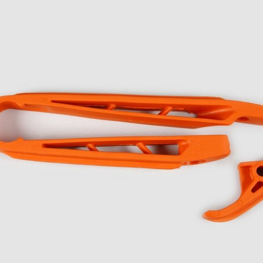 Patín de basculante + Almohadilla de cadena UFO naranja KTM