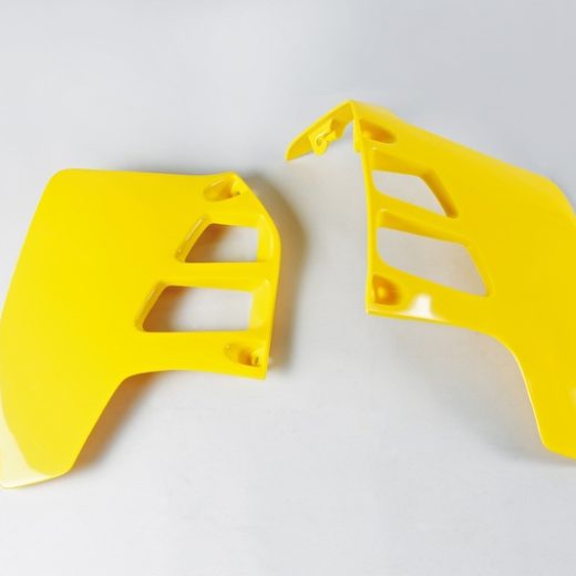 Plásticos laterales de radiador UFO Suzuki amarillo SU02908-101