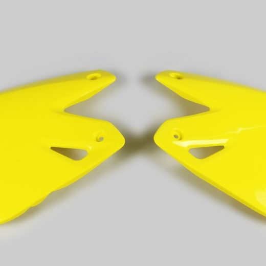 Plásticos laterales de radiador UFO Suzuki amarillo SU03978-102