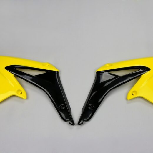 Plásticos laterales de radiador UFO Suzuki amarillo SU04927-102